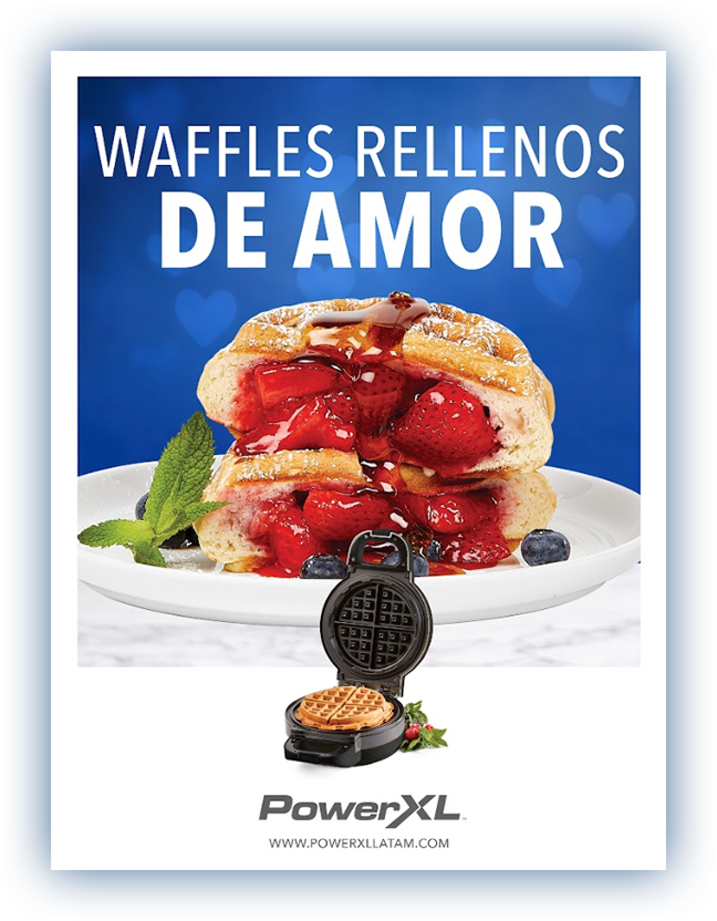Power XL Valentine's Day campaign "waffles filled with love" showing a photo of a waffle filled with strawberries on a plate over a white table and blue background